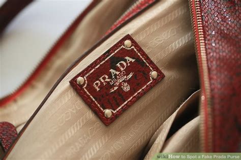 if a bag says prada italy is it a fake|false prada purse.